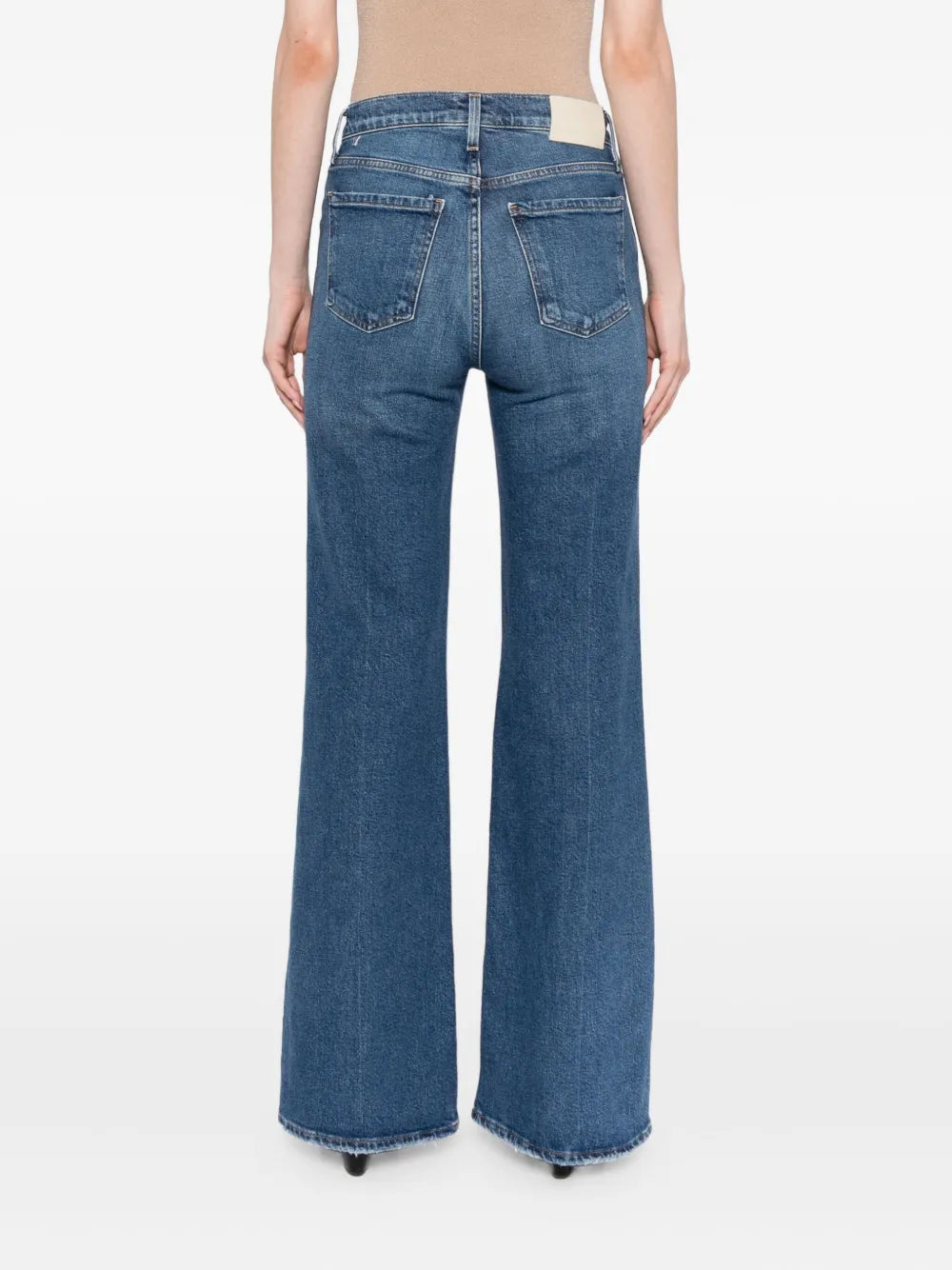 The Kimberly 70's Flare in Cruise styled with a slim knit top, perfect for a chic and clean outfit that showcases its true-to-size fit.