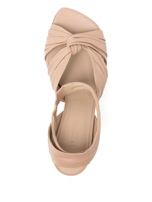 Antonia Pump in Fawn styled with an outfit, demonstrating its versatility and chic appeal for everyday wear.