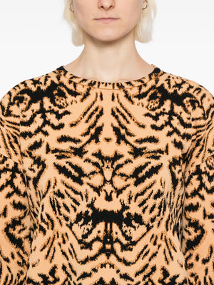 Ulla Johnson's Cade Pullover in Bengal displayed on a mannequin highlighting its chic cold-weather style.