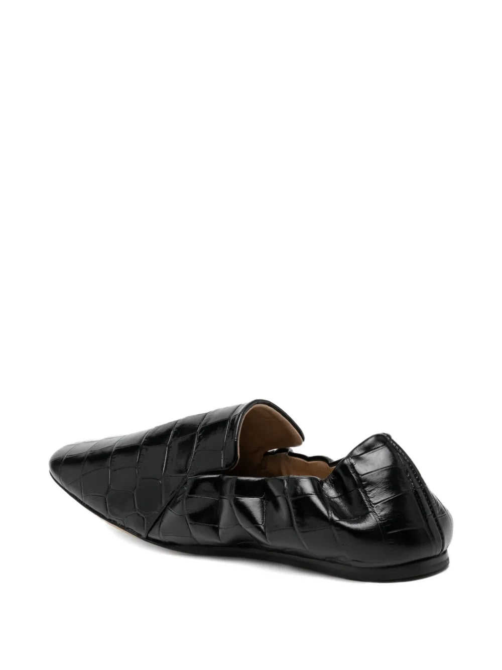 Stylish Orlando Moccasin in Black displayed against a minimalist background, emphasizing its sleek design and 8mm heel.