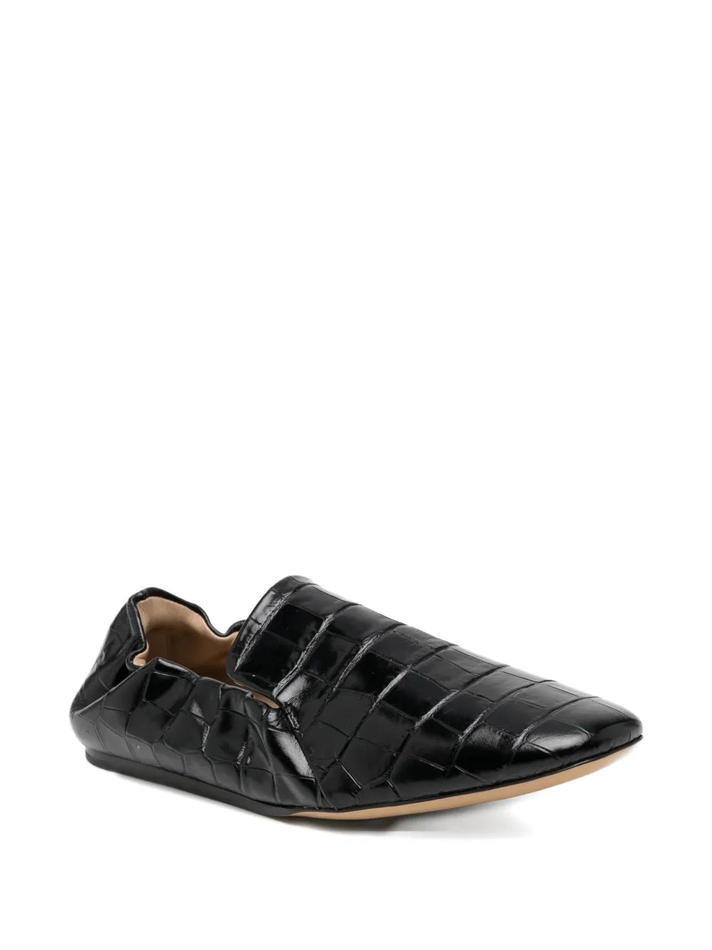 Close-up view of the Orlando Moccasin in Black, featuring cushioned calf leather insole and flexible elasticated back.