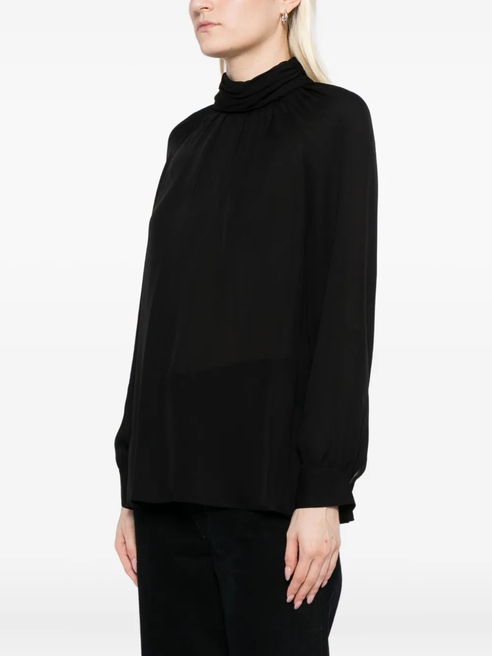 Close-up of the luxurious silk texture of the Axelle Blouse in Black from ZOË.