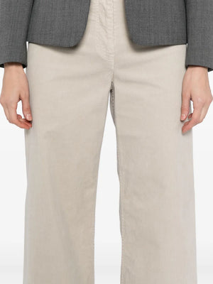 Model wearing Megan Pant in Gesso by Nili Lotan, illustrating the relaxed fit and elegant style.
