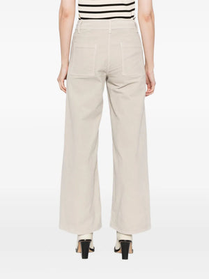 Close-up view of the zip fly and button closure on the Megan Pant in Gesso by Nili Lotan.