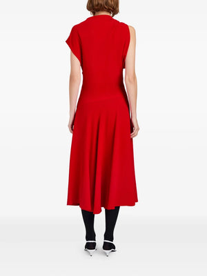 Model wearing the Rue Dress in Red, highlighting the unique silhouette and stylish details by Proenza Schouler.