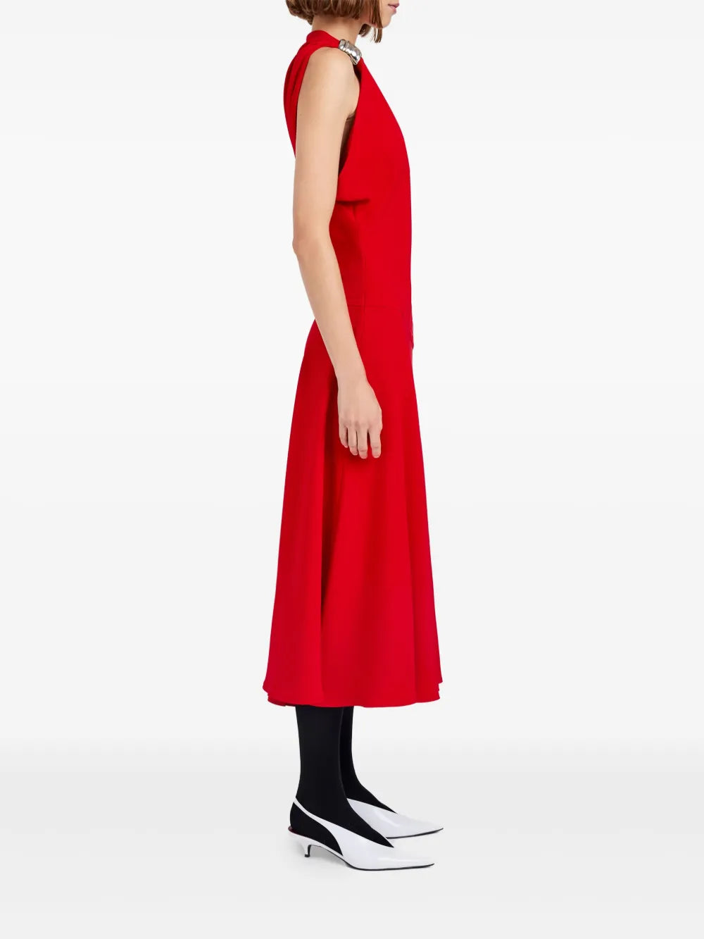 Close-up of the Rue Dress in Red showcasing the angled waist seam and luxurious fabric of Proenza Schouler's design.