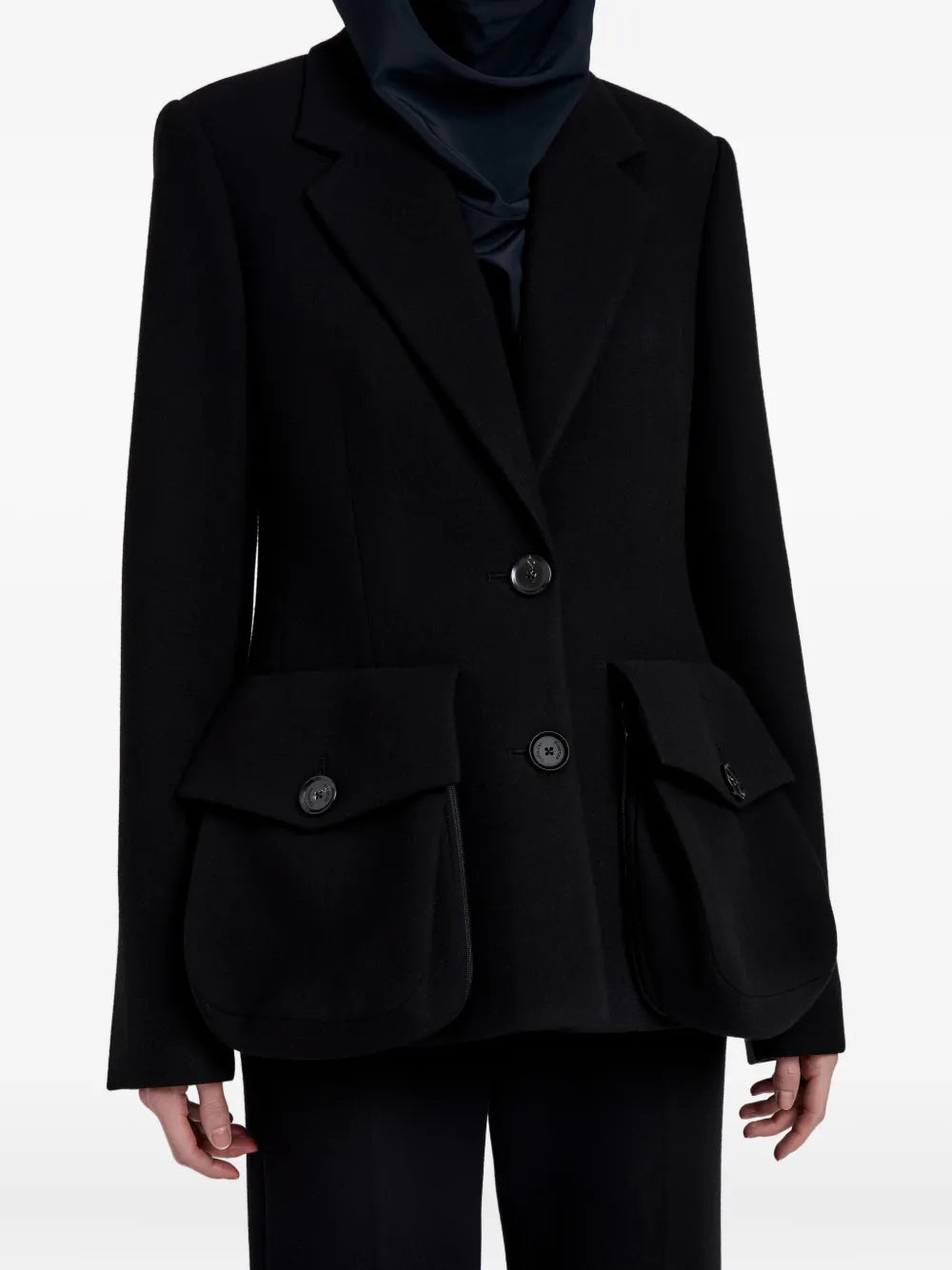 Model wearing the stylish Silva Jacket in Black by Proenza Schouler, tailored for a modern look.