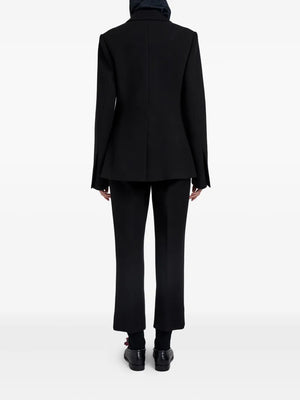 Detail shot of the exposed zippers on the Silva Jacket in Black by Proenza Schouler.