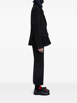 Back view of the Silva Jacket in Black featuring a tailored silhouette by Proenza Schouler.