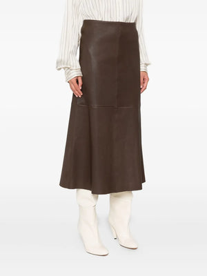 Simoas Leather Skirt in Carafe styled with a boxy T-shirt, portraying versatile fashion options for any occasion.