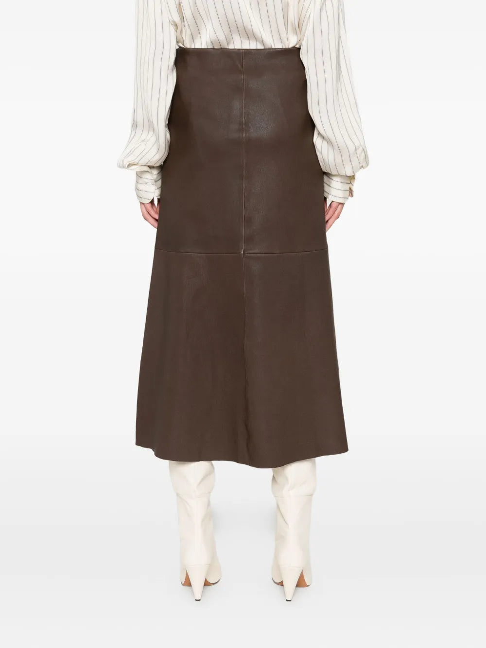 Side profile of Simoas Leather Skirt in Carafe, demonstrating its elegant A-line shape and chic design.