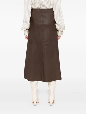 Side profile of Simoas Leather Skirt in Carafe, demonstrating its elegant A-line shape and chic design.