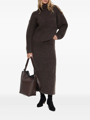 Detailed view of the Sofia Maxi Skirt in Carafe, featuring rib panels and elegant cut-out details from By Malene Birger.