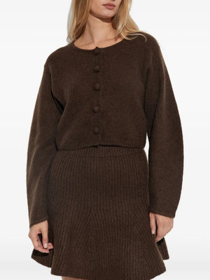 Zharea Cardigan in Dark Mahogany styled with Hannas leather skirt for a chic winter outfit.