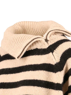 Back view of the Raelynn Cashmere Sweater in Parchment/Black featuring signature cable knit detail.