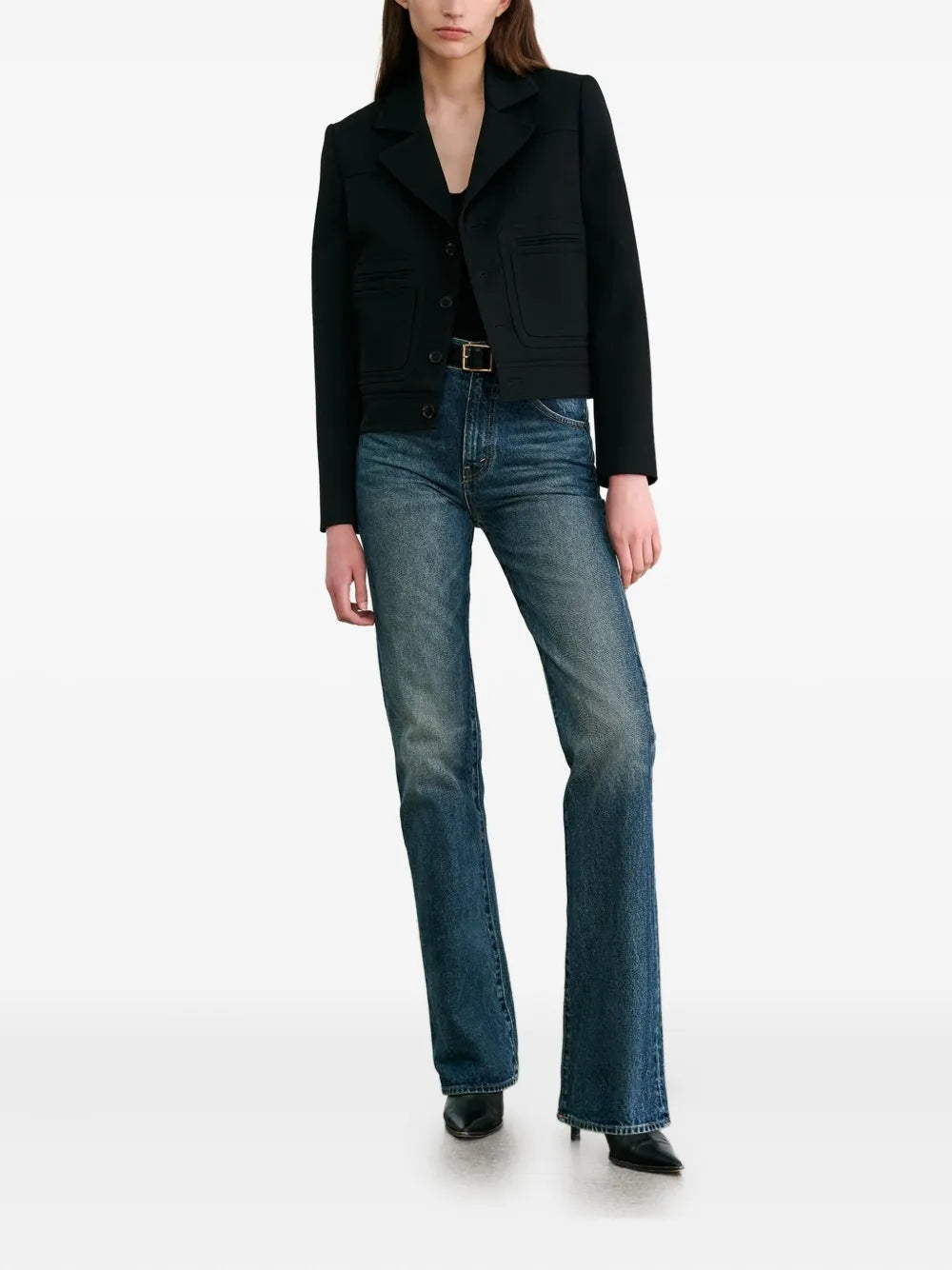 Close-up of the Georgy Jacket in Black features double entry patch pocket and logo horn buttons.