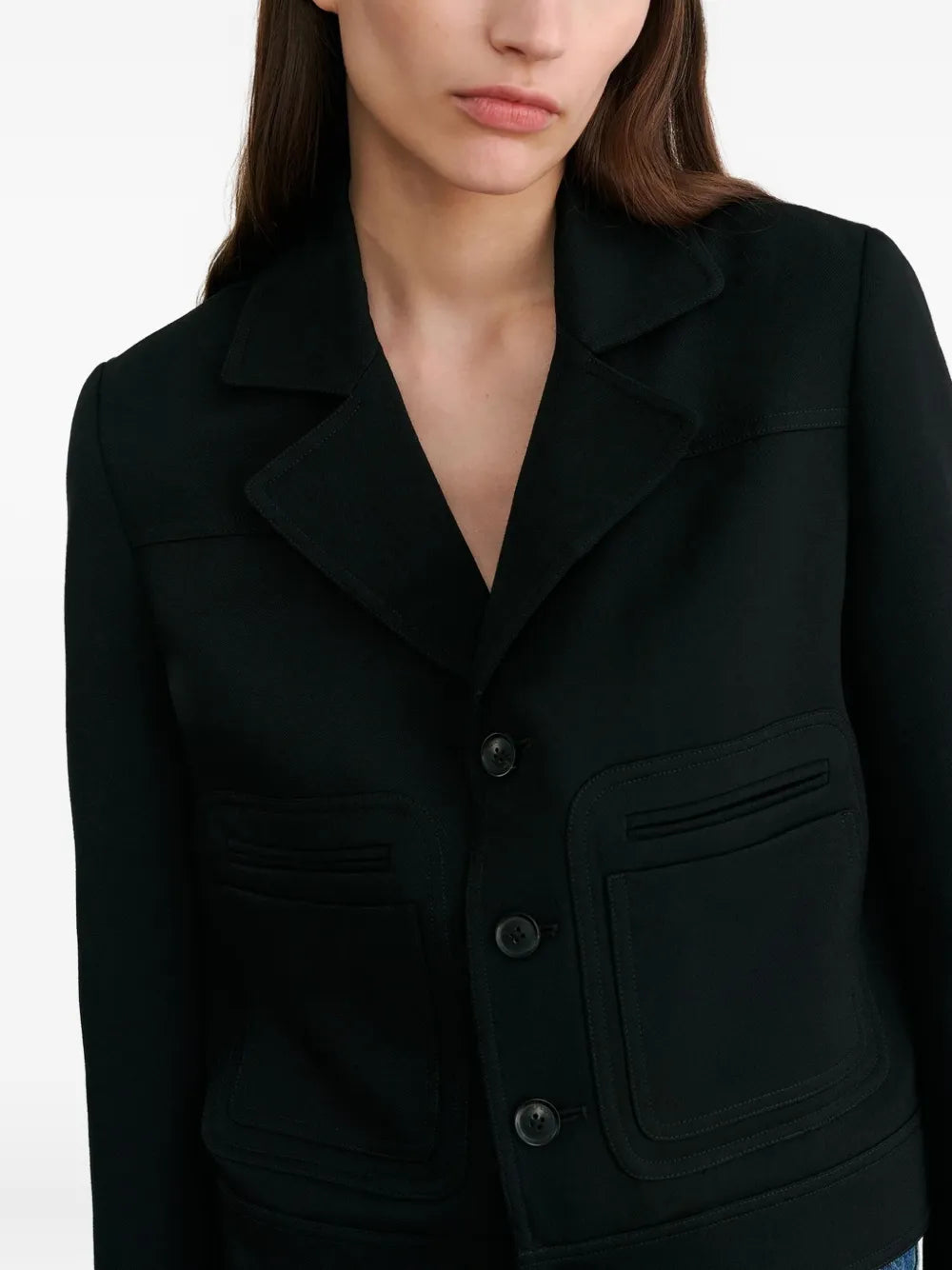 Full-length sleeves of the Georgy Jacket in Black by Nili Lotan emphasizing its chic and modern look.