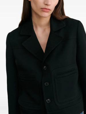 Full-length sleeves of the Georgy Jacket in Black by Nili Lotan emphasizing its chic and modern look.