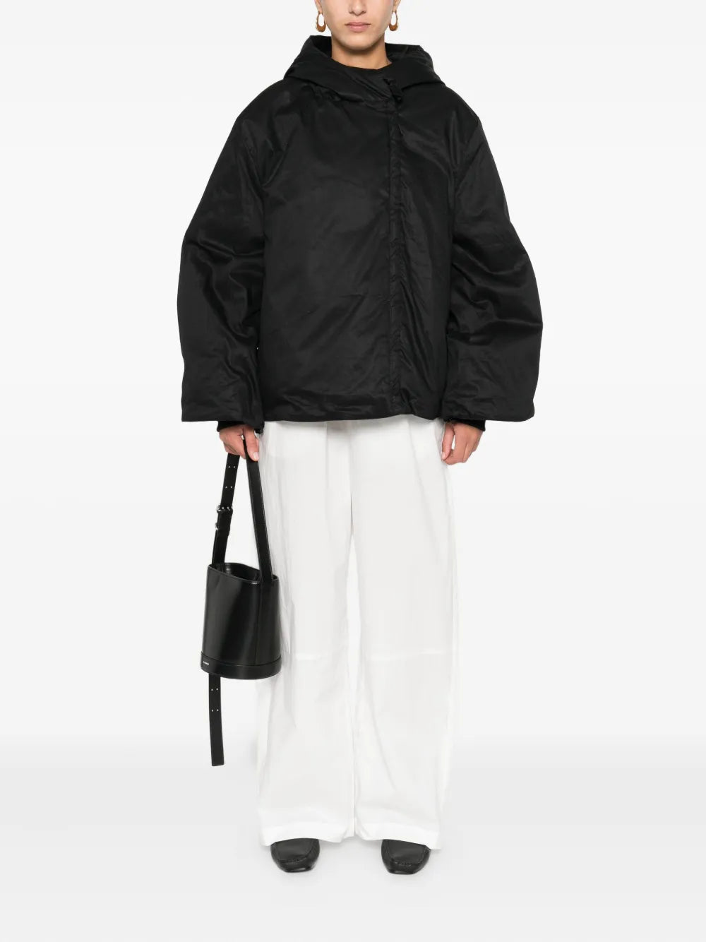 Close-up of the Sallie Jacket in Black showcasing its padded texture and adjustable features.