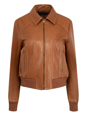 Sue Leather Jacket in Cognac on display, highlighting its shrunken bomber style and antique brass zipper.