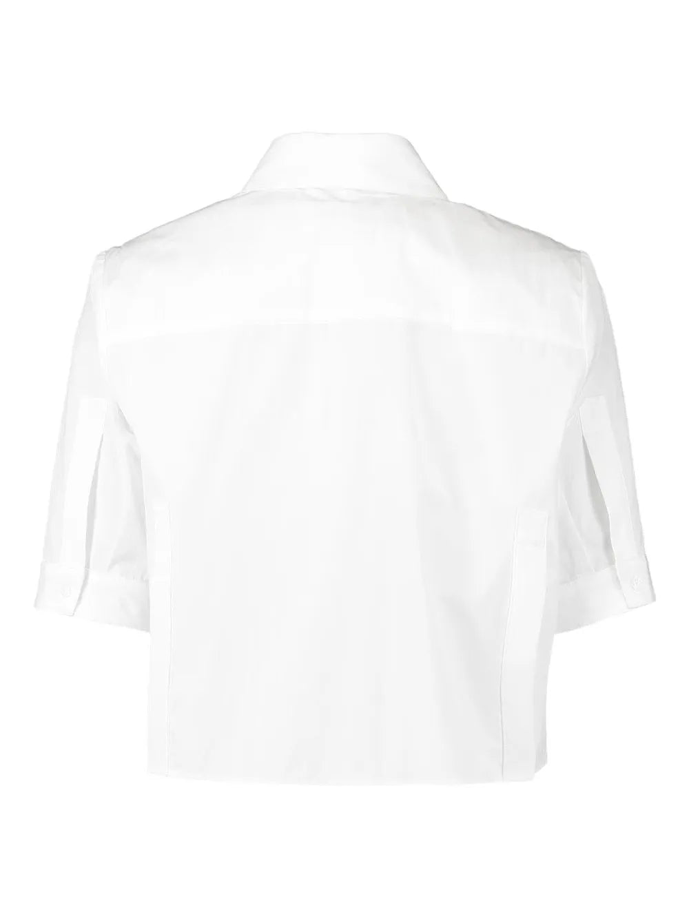 Styled outfit featuring the Short Lived Shirt in White, perfect for casual summer wear.