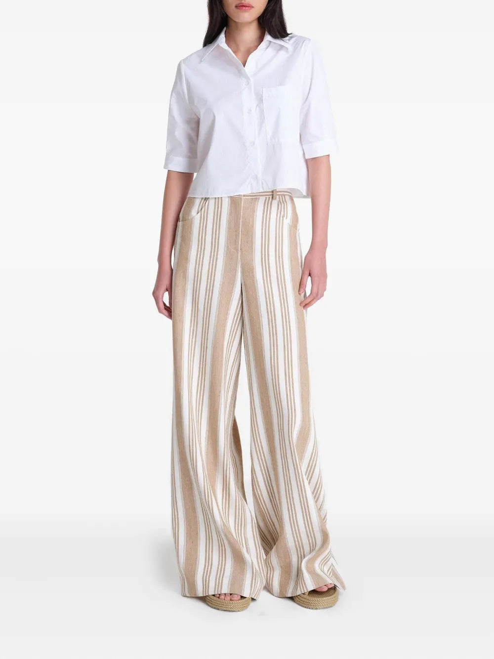 Close-up of the Short Lived Shirt in White, featuring soft cotton poplin fabric and an exposed placket.