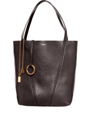 Chloé Spin Tote in Kohl Brown showcasing its shiny grained cowhide material and minimalist design.