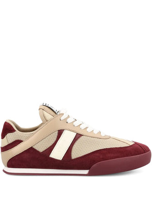 Chloé Kick Sneakers in Beige and Purple featuring smooth and suede cowhide with a debossed logo.