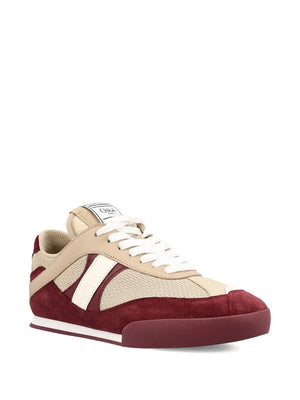 Side view of Chloé Kick Sneakers in Beige and Purple showcasing their unique boxing-style design.