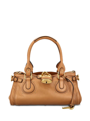 Chloé Paddington Bag in Mustang Brown, showcasing the slouchy buffalo leather design with signature oversized padlock.