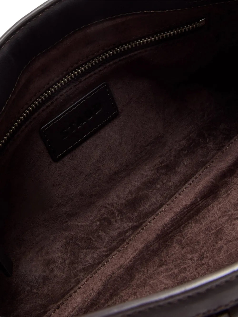 Stylish Maude Soft Clutch in Espresso Woven - a chic woven leather clutch designed by STAUD with a signature knotted detail.