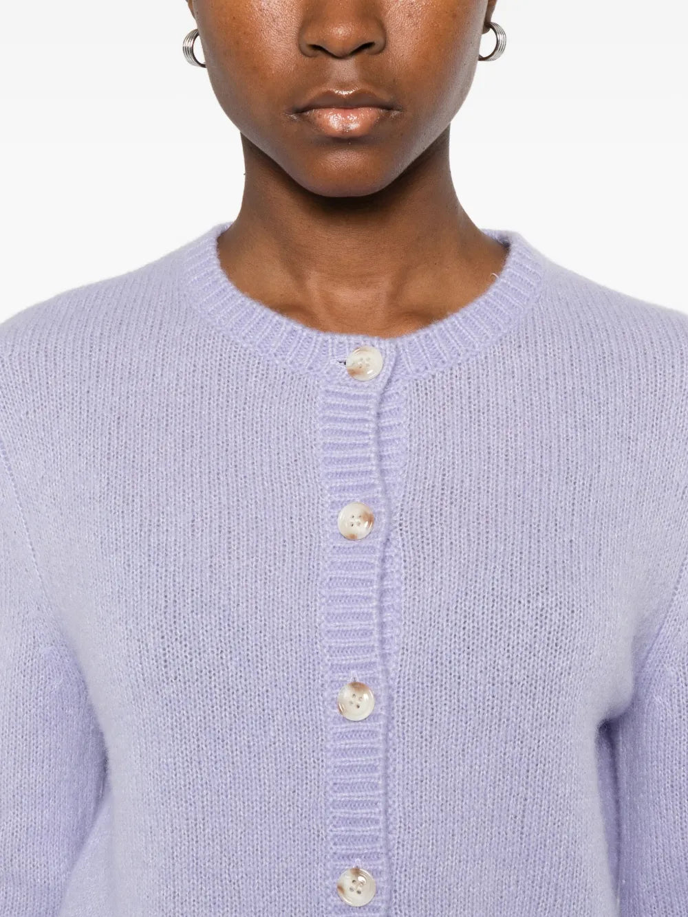 Detail shot of the button-front closure and ribbed trims of the Felicia Cardigan in Soft Lavender.