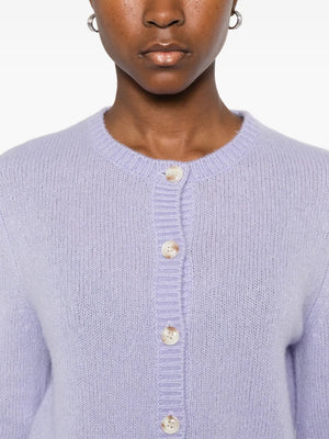 Detail shot of the button-front closure and ribbed trims of the Felicia Cardigan in Soft Lavender.
