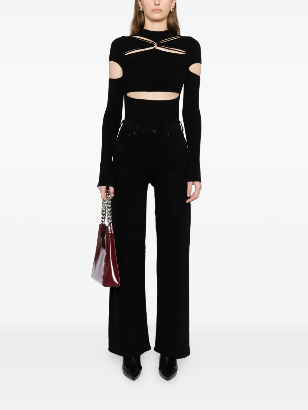 Lyra Long Wide Leg in Plush Black - Side view showcasing the relaxed fit and high waist of the denim jeans.