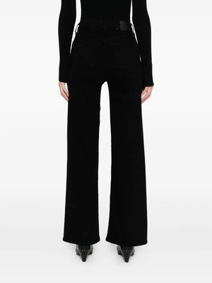 Lyra Long Wide Leg in Plush Black - Close-up detail of the soft stretch denim fabric and zip fly closure.