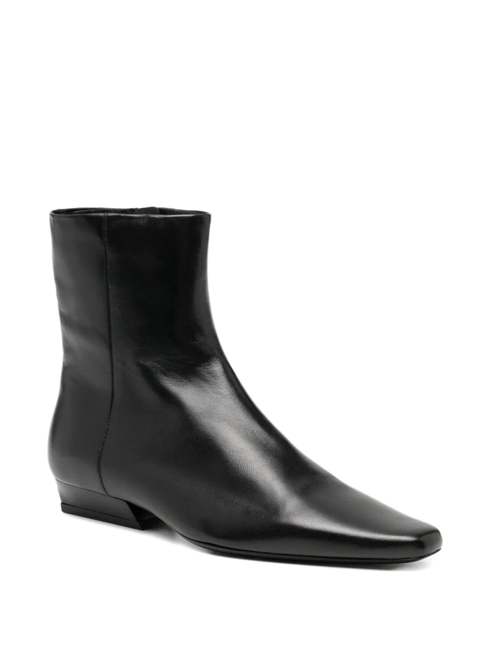 Close-up view of Wally Flat Ankle Boot in Black showcasing the luxurious lamb leather material.