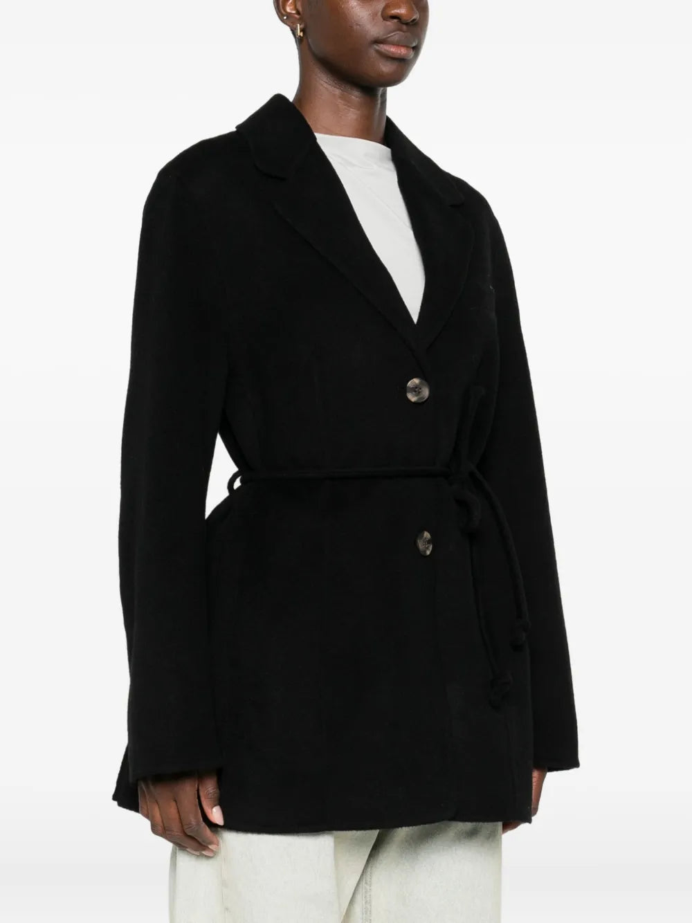 Close-up of the Hellen Blazer in Black, emphasizing the wool composition and sleek design elements.
