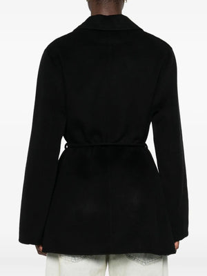 Side view of the Hellen Blazer in Black featuring its detachable waistbelt for a defined silhouette.