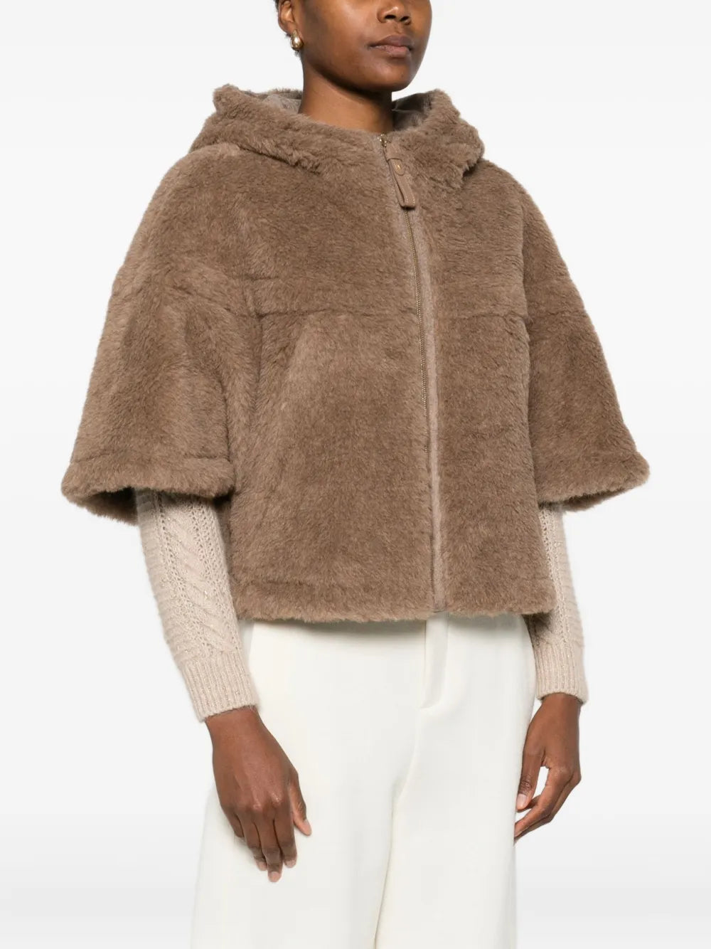 Laying flat, Max Mara's Petal04 Cape in Brown highlighting its hood and boxy fit.