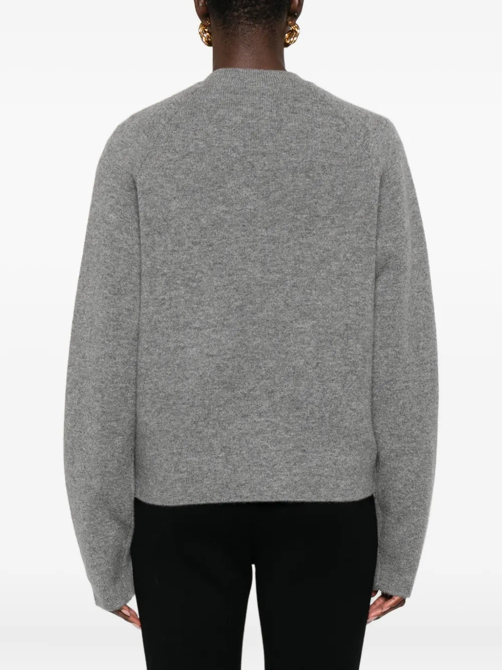 Casual outfit styled with the Hammered Botton Cardigan in Grey Melange paired with tonal trousers for a chic look.