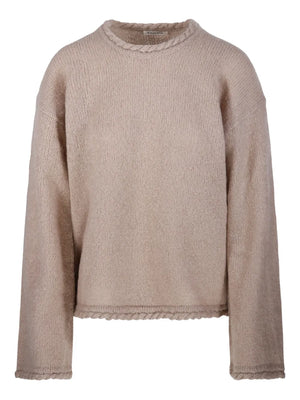 Cierra Sweater in Cobblestone by By Malene Birger - stylish knitwear with a distinctive braided hem, perfect for layering in cooler weather.