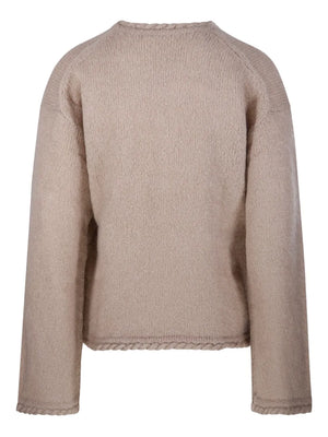 Close-up of the Cierra Sweater in Cobblestone by By Malene Birger, showcasing the round neckline and elongated sleeves for a cozy fit.