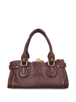 Interior of the Chloé Paddington Bag in Grenat highlighting the cotton lining and pocket design.
