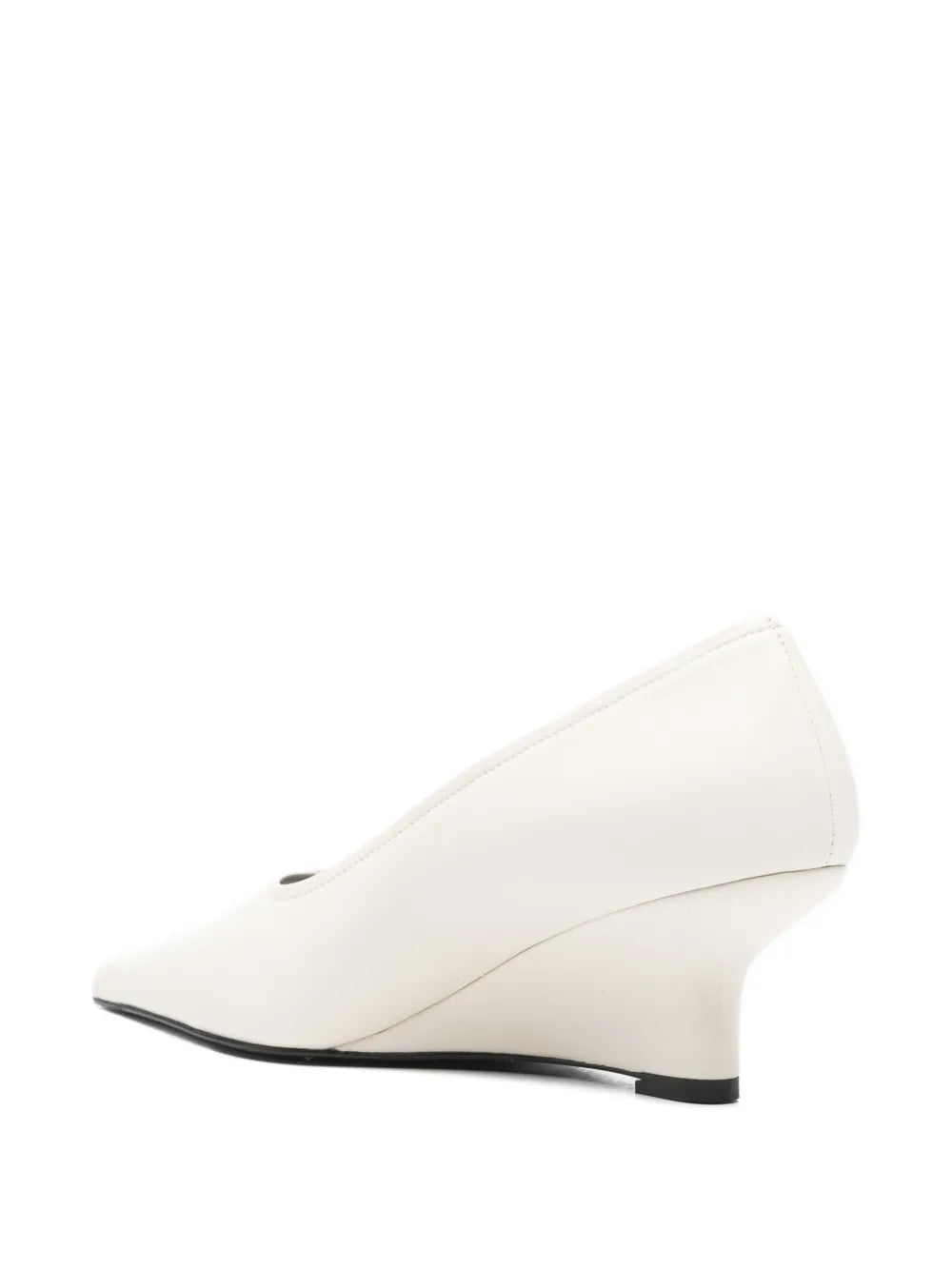 Side view of the Sharp Nappa Wedge Pumps in White demonstrating the chic silhouette and versatility for casual to formal wear.