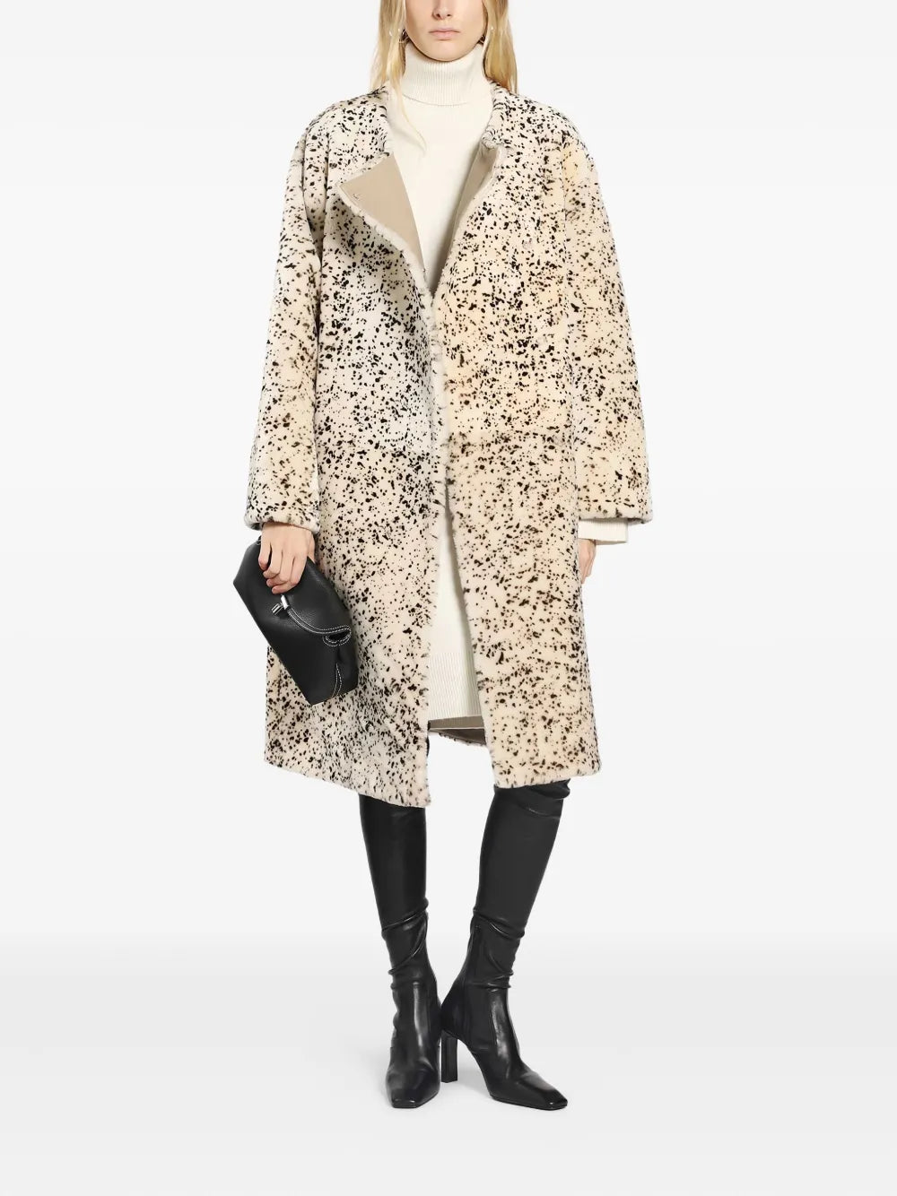 Back view of the Broad Turtleneck Dress in Milk illustrating the elegant design and premium fabric details.