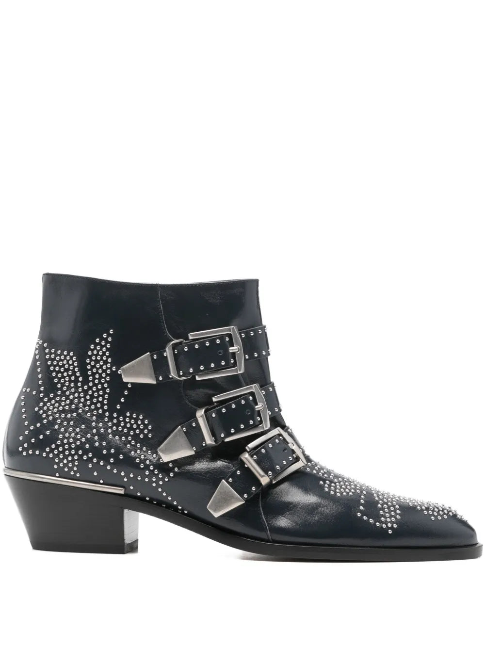 Susanna Short Boot in Deep Navy showcasing its glossy nappa sheepskin finish and vintage buckles.