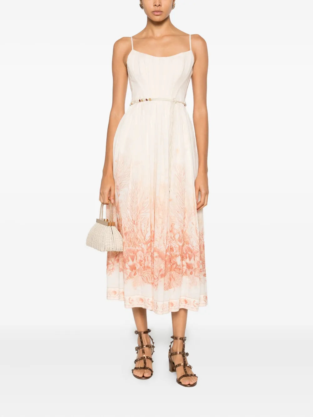 Close-up view of the scoop neckline and gathered waist of the Wanderlust Corset Midi Dress in Coral Toile by Zimmermann.