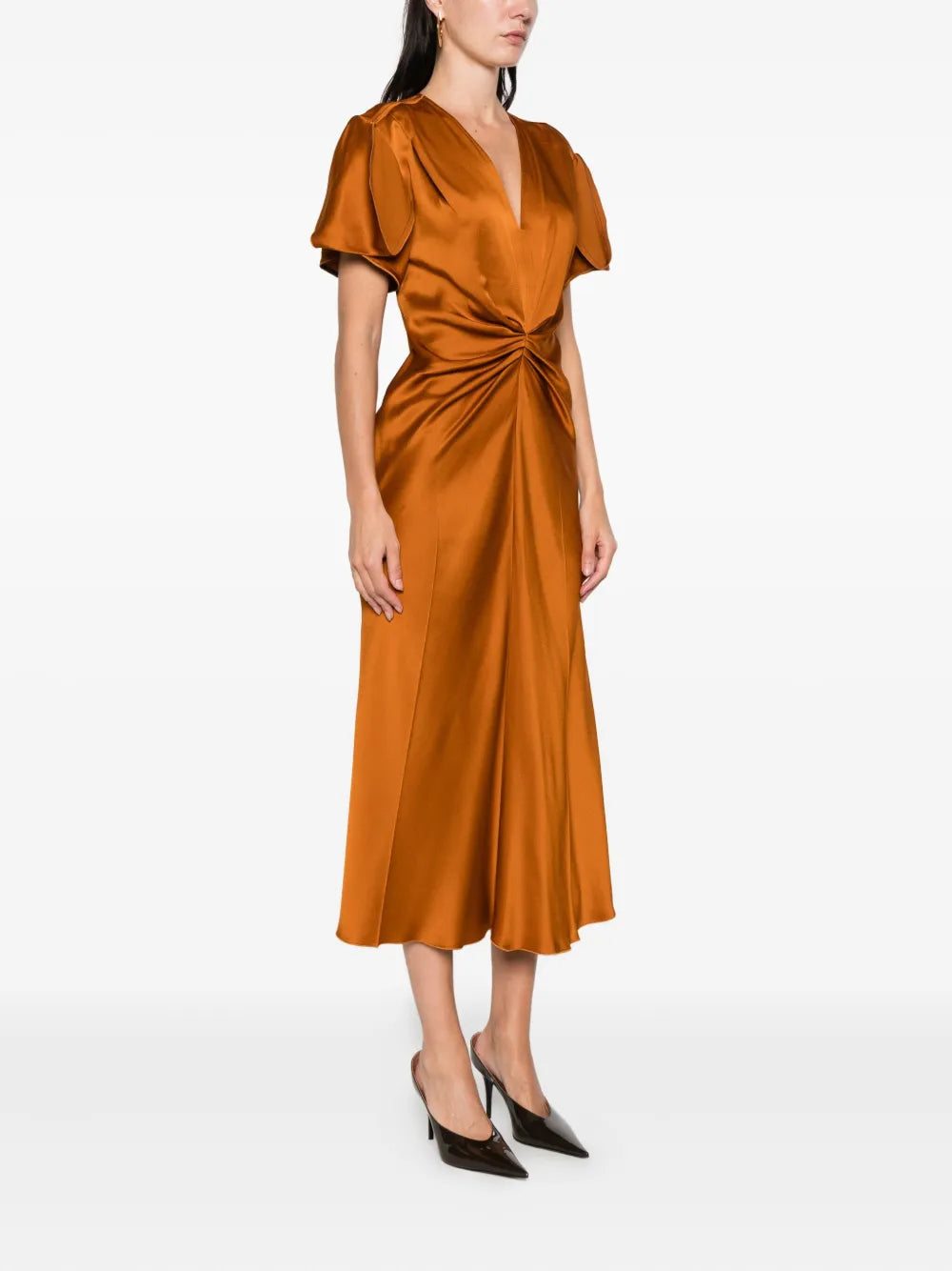 Eve Midi Dress in Bronze by Victoria Beckham displayed on a model, highlighting its relaxed fluidity and sophisticated design.