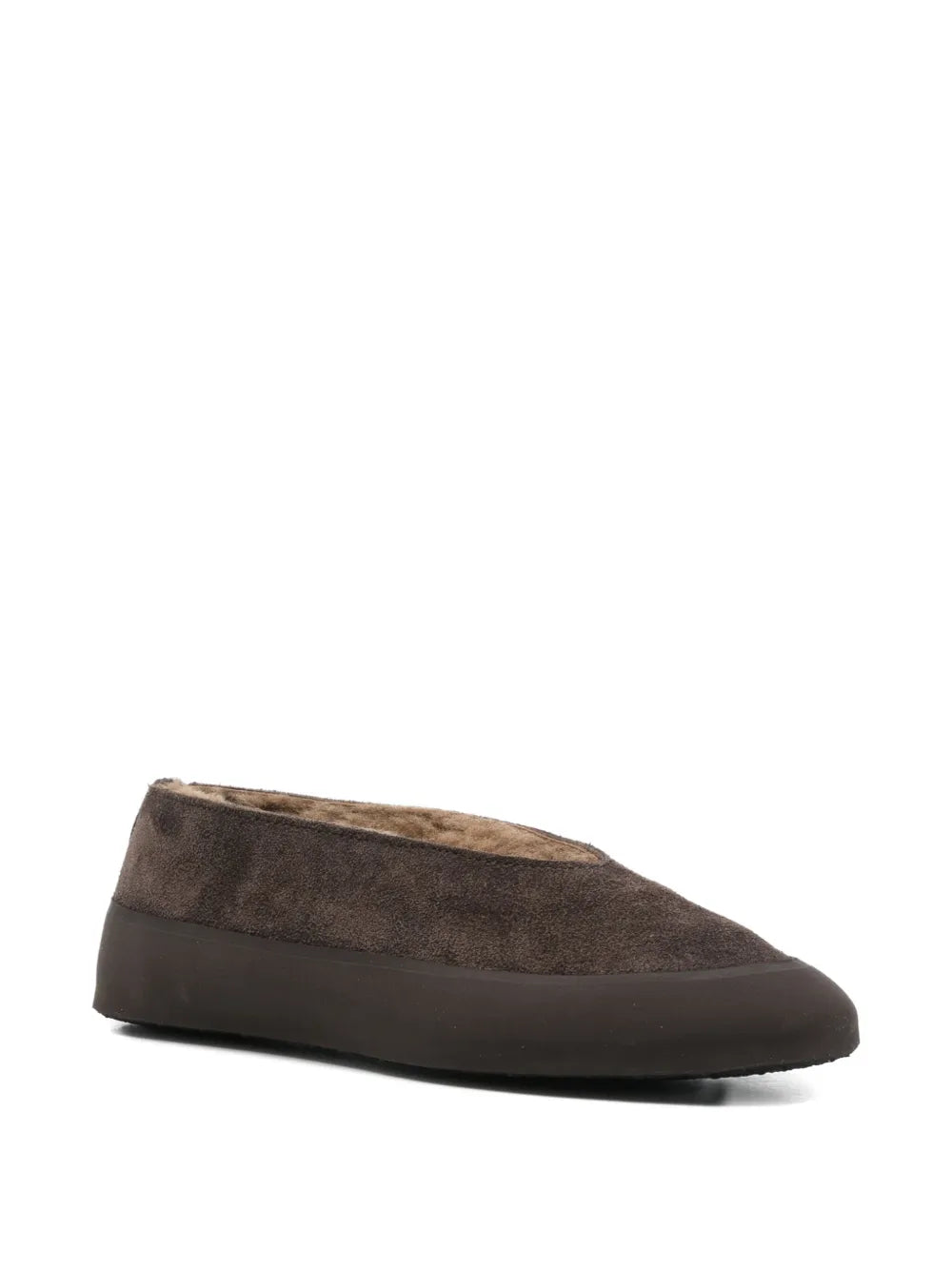 Stylish Apres Ski in Brown Shearling featuring smooth rubber tread and a cozy design.