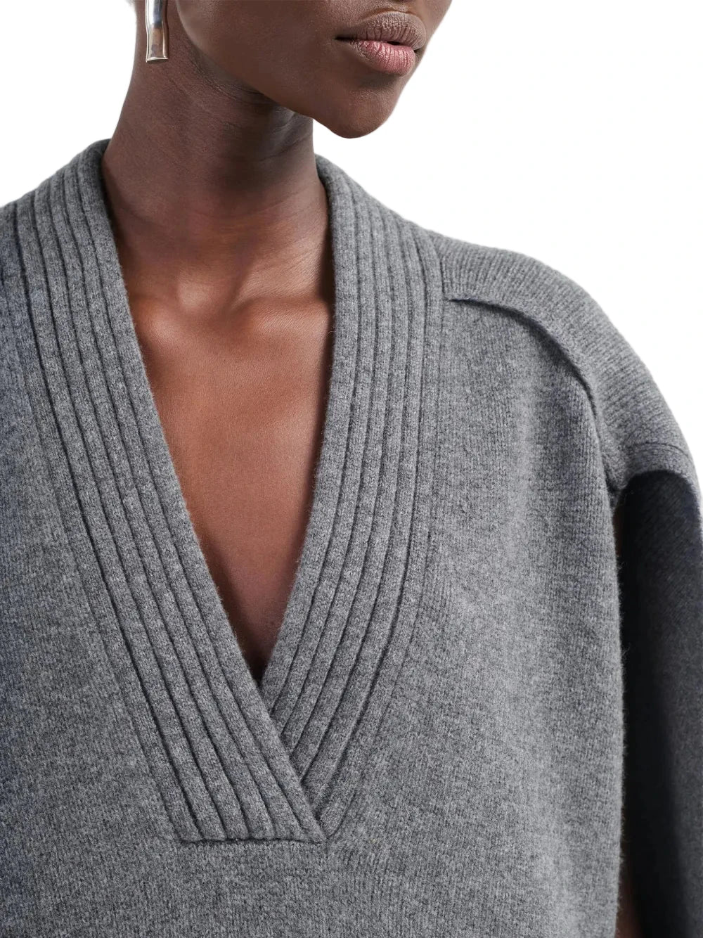 Back view of the Cocoon Cape Sweater in Medium Heather Grey displaying the elegant cocoon shape.